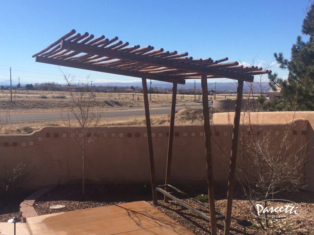 cantilevered shade structure with rust finish