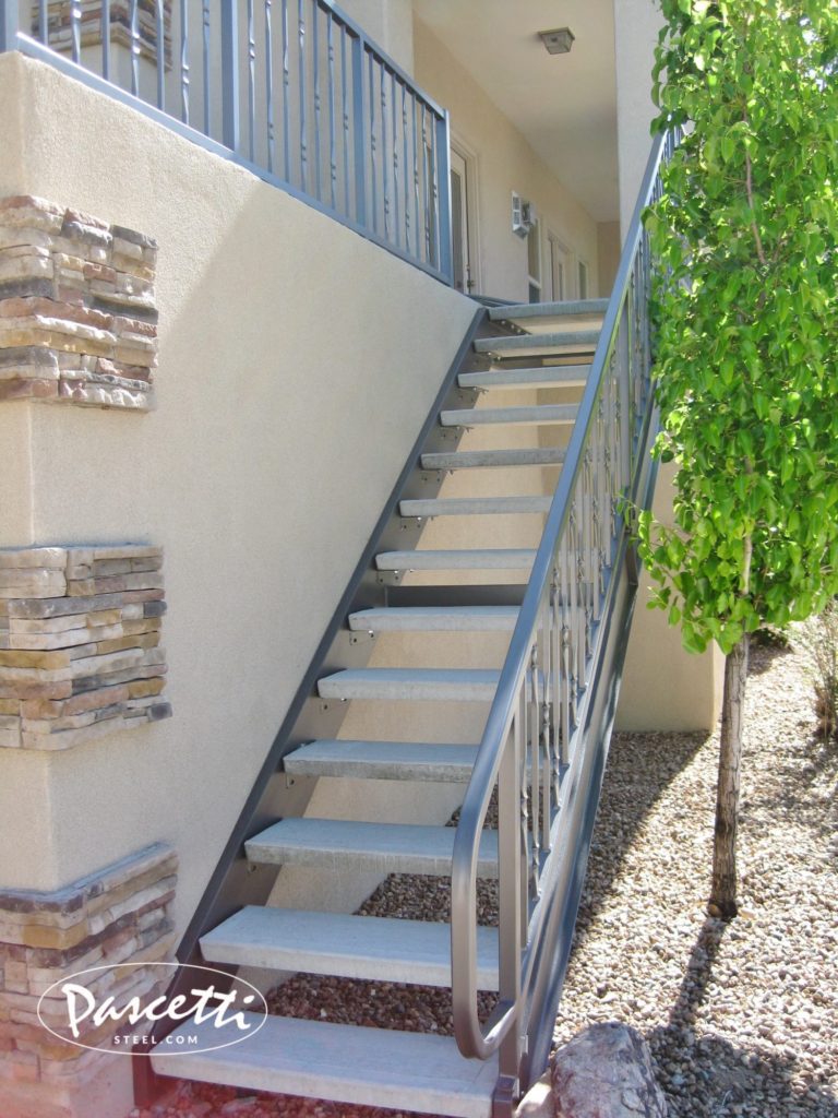 custom residential steel stair rails with concrete treads
