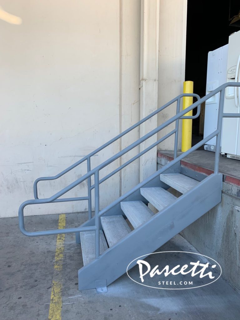 custom steel stair railing with concrete treads