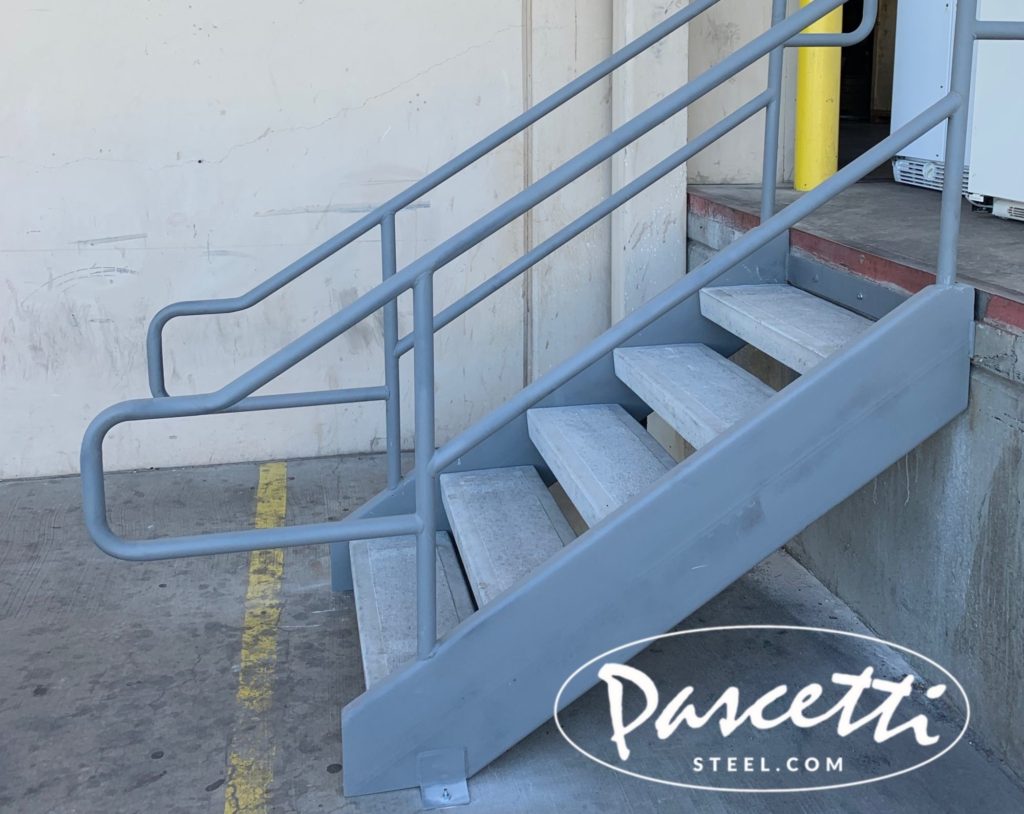 custom steel stair railing with concrete treads