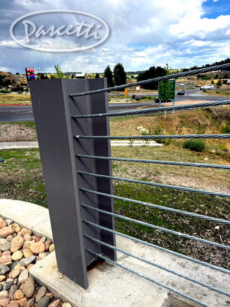 External urban parking garage high tension guardrail for crash resistance