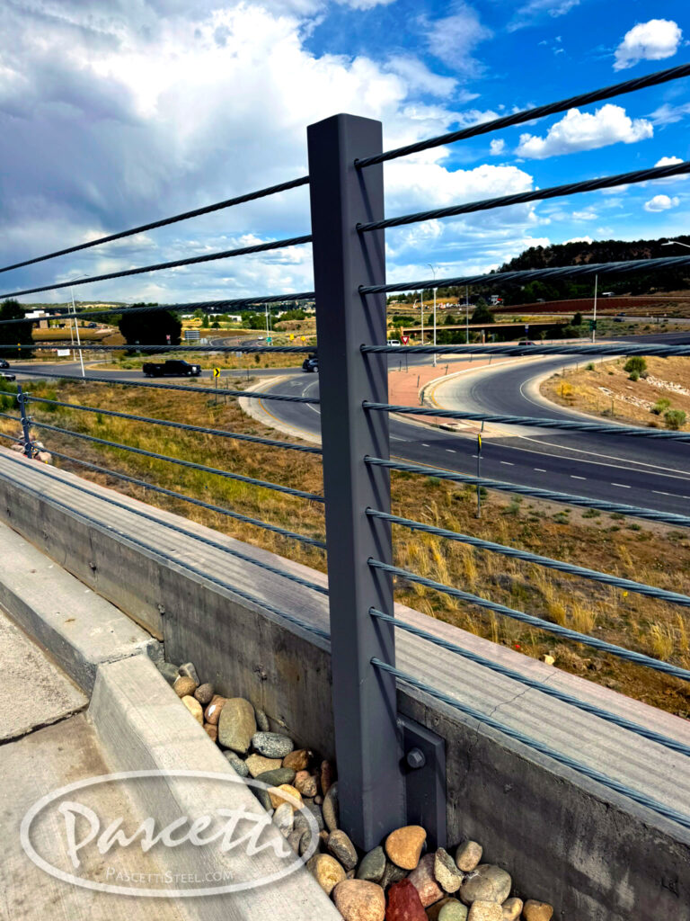 High tension cable barrier system protecting vehicles from roadway accidents