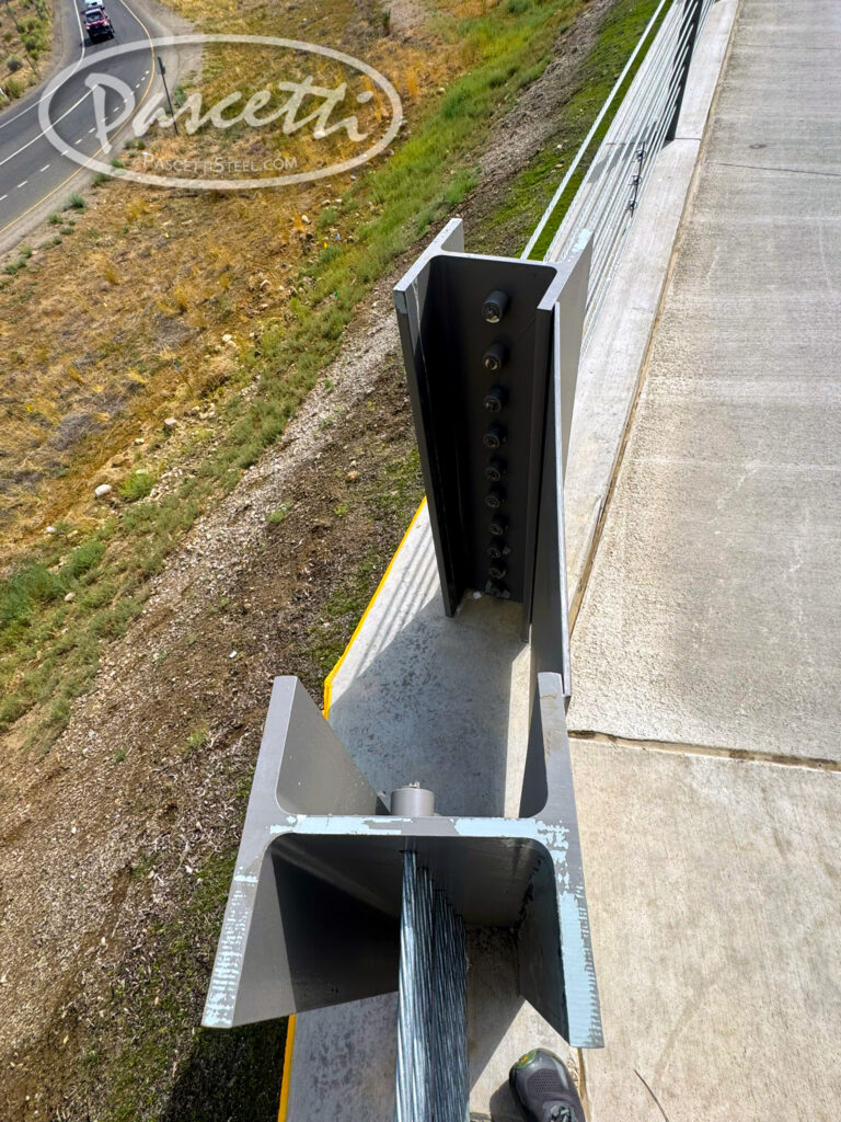High tension cable barrier system reducing vehicle crash impact large steel beam corner connector