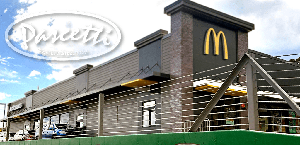 High tension cable restraint reducing vehicle crash impact McDonald's Drive Thru, Durango Colorado