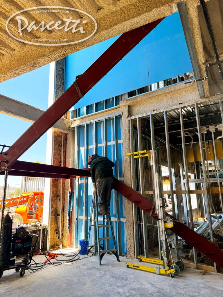 Prefabricated custom steel stairs during construction. 