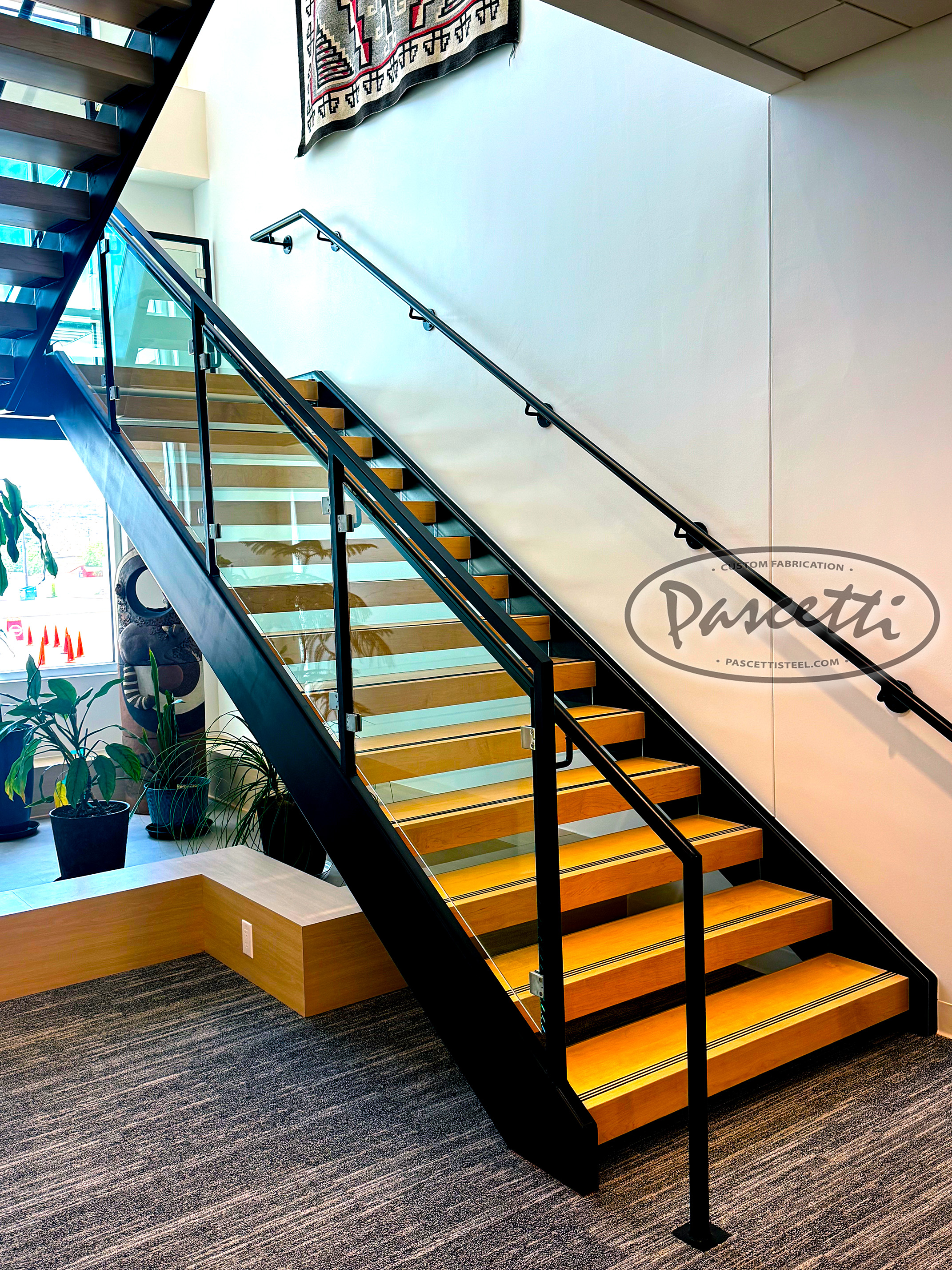 cantilevered stairs with glass railings