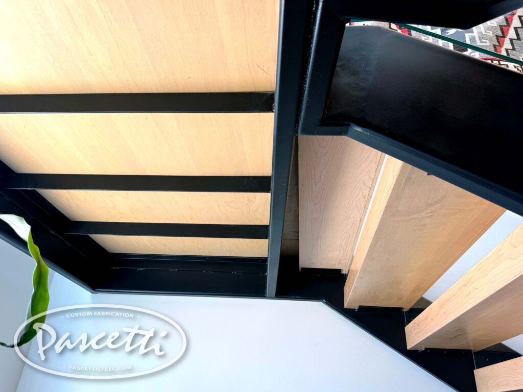 Matching Landing Wood Underside. Cantilevered Stairs with Glass Railing